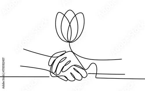 Two hands shake and a lotus flower grows from their connection.