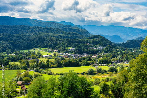 Fototapeta Naklejka Na Ścianę i Meble -  View of the mountains and small villages surrounding the historic town of Radovljica, Slovenia.