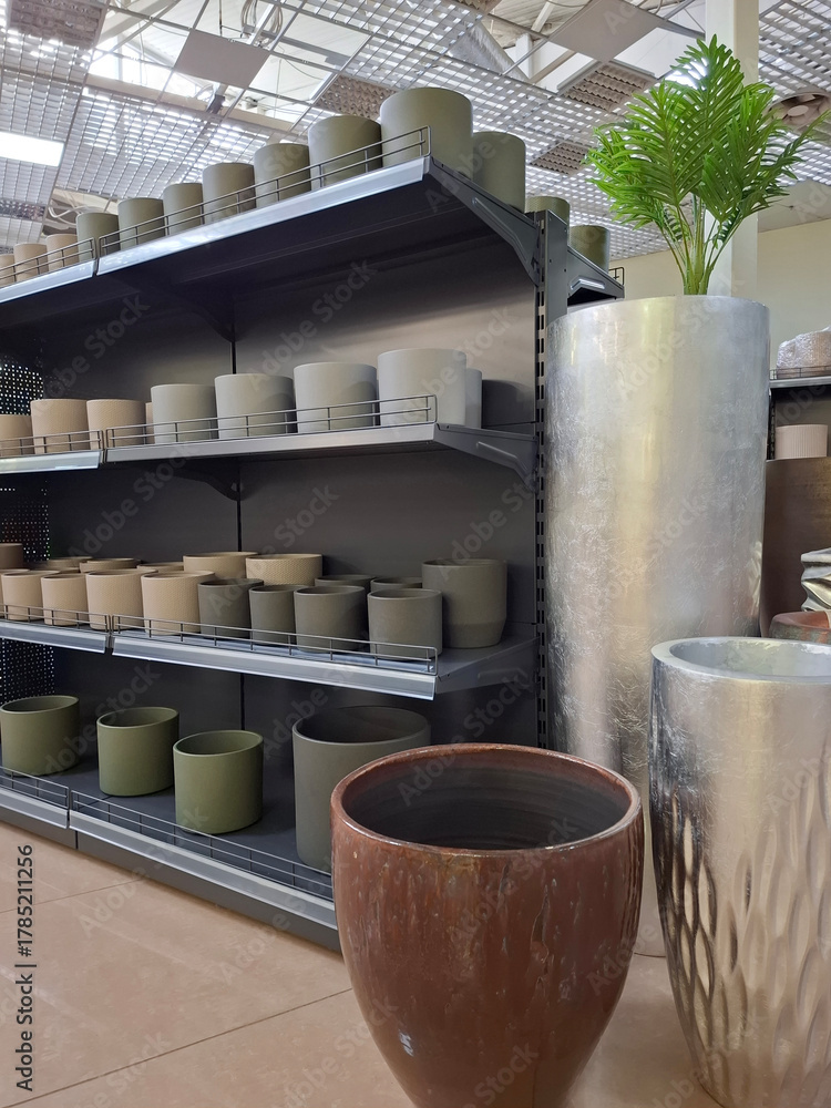 Fototapeta premium Many ceramic pots in flower shop