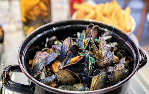 Mussels steamed in white wine or moules marinieres at a restaurant, Nice, France