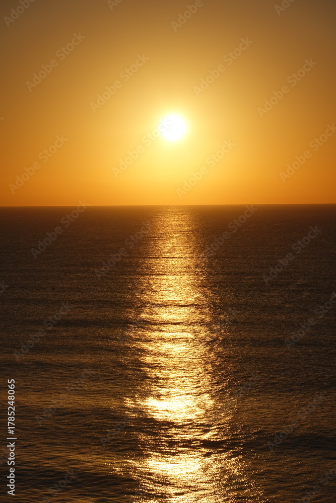 Fototapeta premium Sunset. Sunrise. Golden waves.
