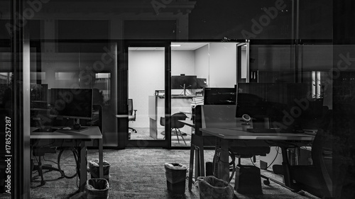Black and white abstract of empty office interior at night