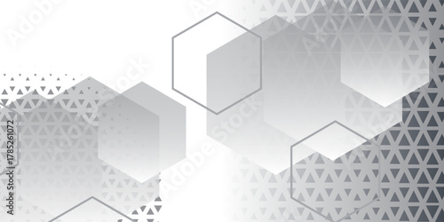 Futuristic abstract modern design with a combination of transparent hexagon shapes and geometric triangle patterns in gradient gray tones