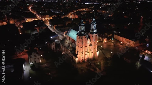 Aerial Gniezno Poland cathedral cityscape night fast. Since 1000 AD, main church of the Gniezno. Basilica of the Assumption of the Blessed Virgin Mary or the Sanctuary of St. Adalbert. 