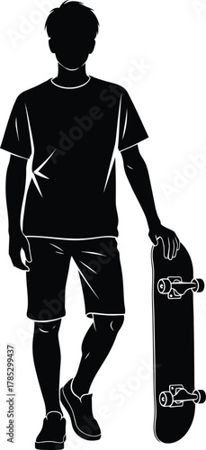 Silhouette of Young Boy Standing with Skateboard