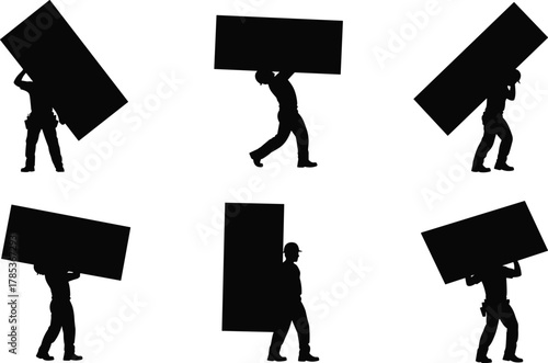 Construction workers carrying panels, black silhouette, manual labor, safety helmet, building site, heavy lifting, teamwork pose, industrial effort, tool belt