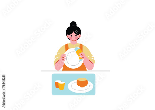 お皿洗いをする女性