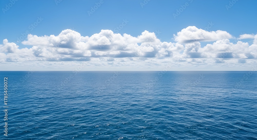 Fototapeta premium Blue Sky Over Calm Ocean Waves
