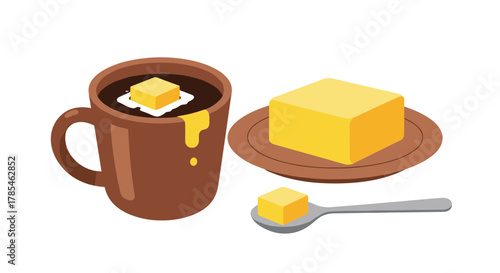 A cup of bulletproof coffee with a pat of melting butter, alongside a block of butter on a plate and a spoonful of butter.