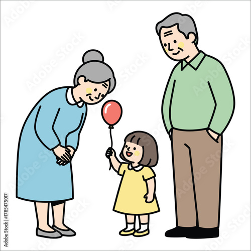 Little girl giving balloon to grandparents Keywords: family, grandparents, granddaughter, child