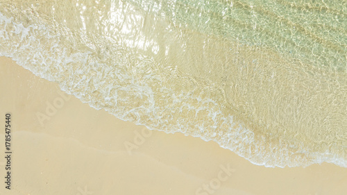 Nature of the ocean and blue sky Summer with sunshine, sandy beaches, clear blue waters sparkling against the blue sky. on an island with good ecology and environment Background for summer vacation