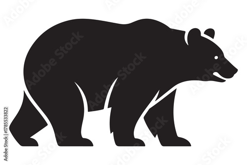  Black silhouette of a walking grizzly bear in profile view silhouette