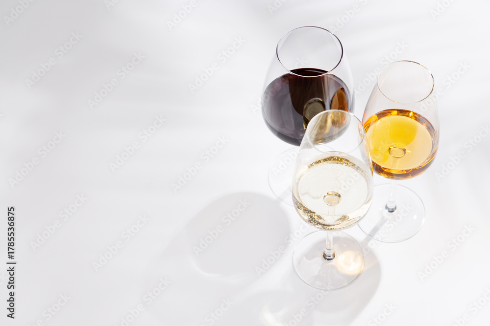 Fototapeta premium Different wine glasses on white background