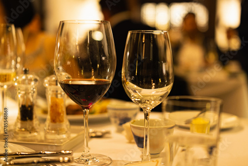 Wallpaper Mural Red and white wine glasses on a beautifully set table, Fine dining and wine, Luxury table setting. Torontodigital.ca