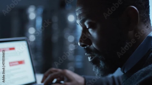Phishing Scam, Man Hesitates to Click Link in Dark Room