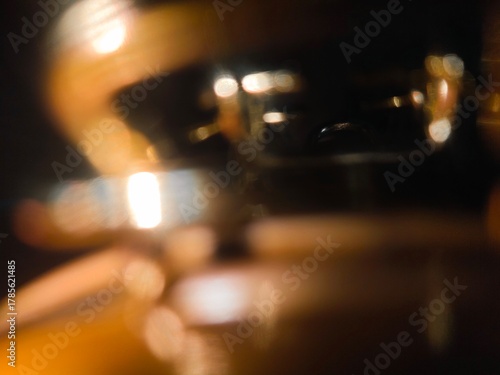 Bokeh background effect The atmosphere is very luxurious and precious. Glittering yellow gold diamonds fell. Contrasts beautifully with the black background.