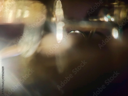 Bokeh background effect The atmosphere is very luxurious and precious. Glittering yellow gold diamonds fell. Contrasts beautifully with the black background.