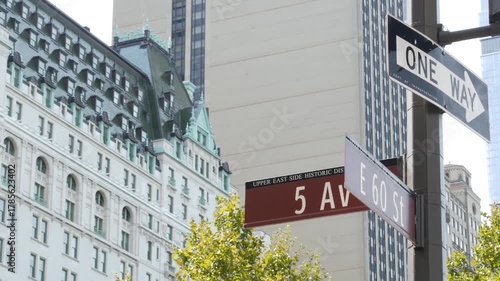 New York City Manhattan Midtown, United States. Old historic hotel building 1907 on Grand Army Plaza, 5 fifth avenue sign near Central Park. Classic iconic american architecture. Pulitzer Plaza in NYC