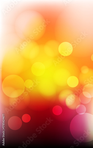 Abstract vertical bokeh background with a warm color gradient. Glowing yellow, orange, and red circles for a vibrant modern design.