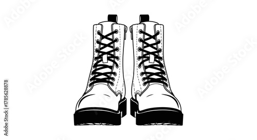 a pair of classic black combat boots with thick laces, isolated on white background 