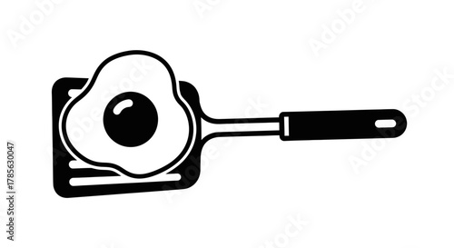 a frying pan with an egg cooking inside it, isolated on white background 