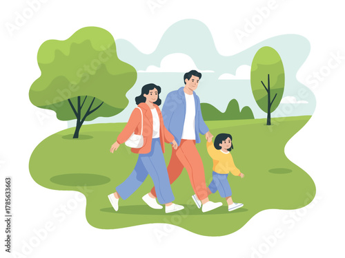 A happy family enjoys a leisurely walk through a lush green park on a sunny day.