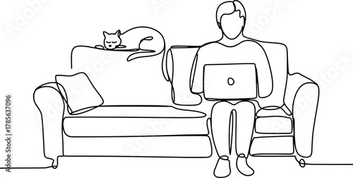 Person working on laptop with cat on sofa cozy home office freelance lifestyle