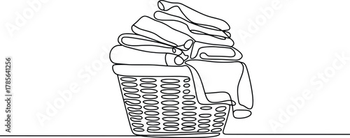 Clean laundry basket with folded clothes artistic line drawing style