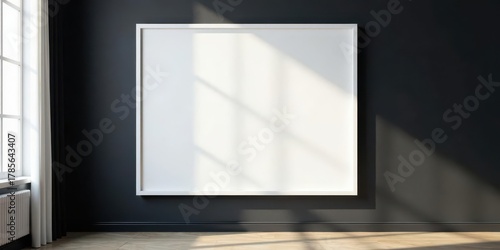 Modern minimalist interior with large blank frame, sunlight streaming through window, showcasing empty wall space for artwork or design presentation