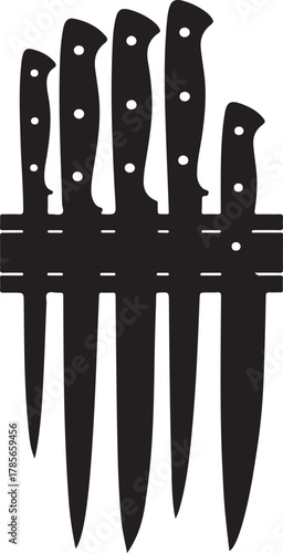 Set of Five Kitchen Knives Arranged on a Magnetic Strip Holder knife cooking