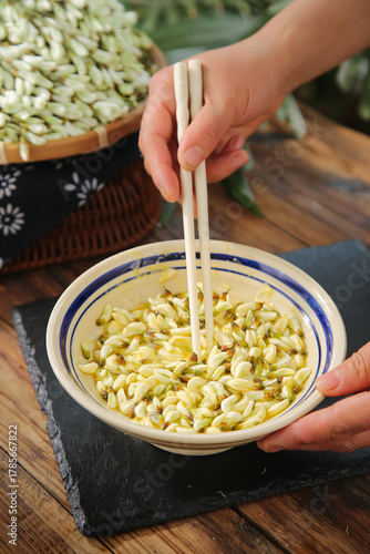 Fresh Sophora Flower Buds Wild Vegetable Asian Cuisine with White Chopsticks Traditional Food