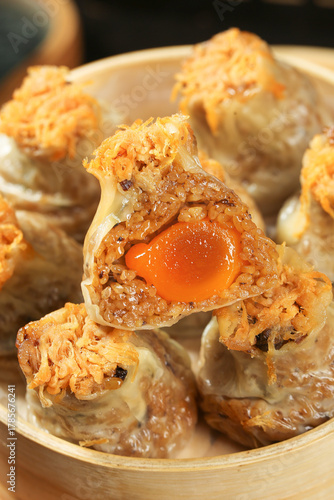 Handmade Siu Mai Dumplings with Salted Egg Yolk in Bamboo Steamer - Traditional Chinese Dim Sum