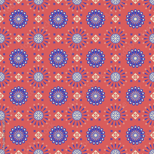 A bright blue floral pattern on a coral-orange background, evoking a cheerful and bohemian vibe. Ideal for summer fashion, scarves, home decor, or retro-style accessories. 