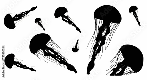 Ethereal jellyfish drift in dark, mysterious ocean depths, creating a mesmerizing underwater ballet.