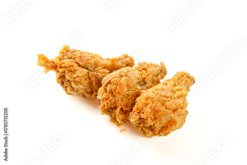 Delicious Golden Crispy Fried Chicken Thighs Isolated on White Background