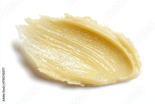 Hydrating Vaseline Application. Dollop of creamy skin care product. Glossy balm texture. Petroleum jelly ointment swatch. Swoosh swatch sample cosmetics. Facial jelly, cleanser. Drop isolate on white.