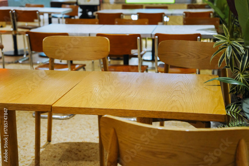 Food Court with Wooden Tables and Chairs in a Shopping Mall