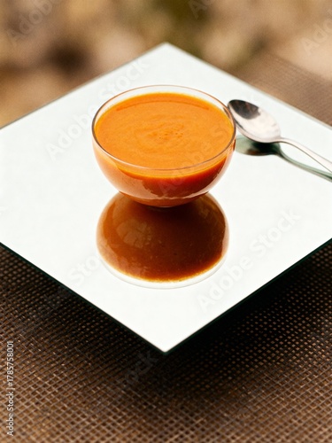 Mirrored Perfection: A Symmetrical Bowl of Carrot Soup.