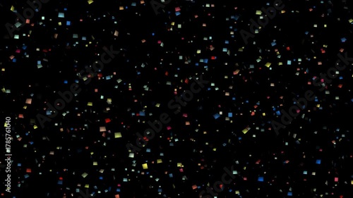 Festive rainbow rain of confetti on a black background. Abstract digital field of particles with rainbow colors.