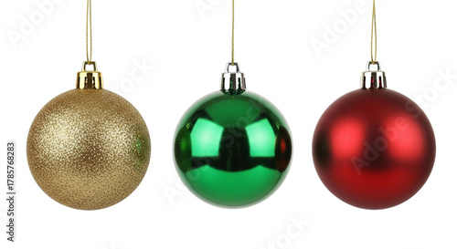 Three christmas ornaments, a gold glitter ball, a green bauble, and a red bauble, hanging isolated on transparent background