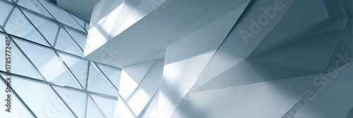 Modern corporate building interior with geometric white walls and glass windows