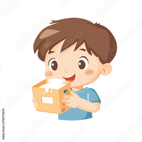 Happy boy enjoying a refreshing drink from a carton with a smile.