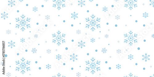 Seamless blue snowflake and dot pattern on clean white background
