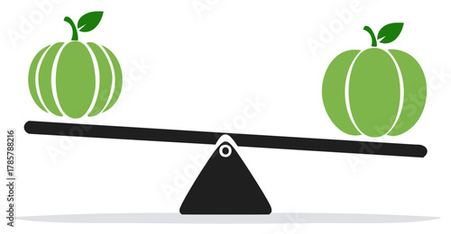 Green Pumpkins Balanced on a Seesaw Illustrating Equilibrium