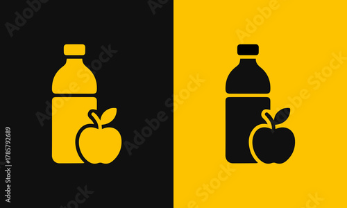 A bottle of juice and an apple on contrasting black and yellow backgrounds