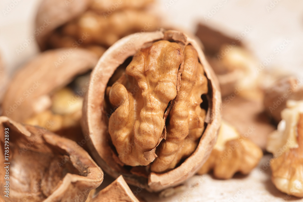 Fototapeta premium Close up of cracked walnuts 