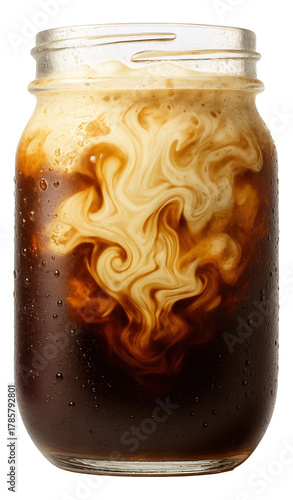 Mason jar filled with cold brew coffee, topped with a swirling layer of oat milk