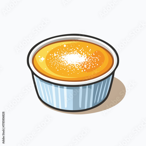 A delicious creme brulee dessert in a blue ramekin viewed from above on a white surface