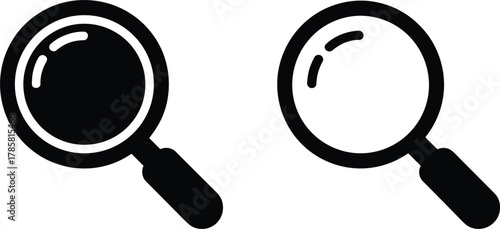 Two black magnifying glass icons one filled one outline search symbol