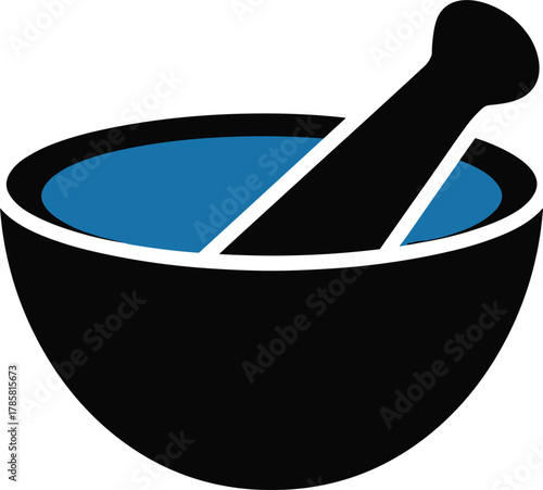Black mortar and pestle with blue liquid grinding